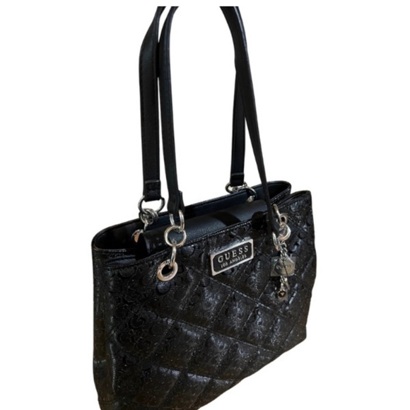 Guess Black shoulder bag. Like new! still has plastic on it and it’s authentic!! - Picture 4 of 8